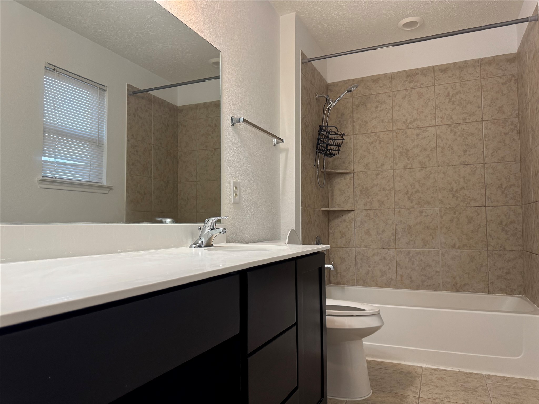 15815 Copper Oak Lane Houston, TX 77084 - Photo 22 of 33 a bathroom with a sink a toilet and shower