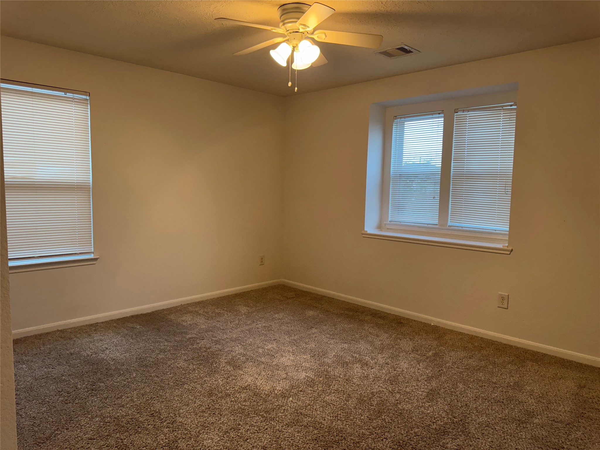 15815 Copper Oak Lane Houston, TX 77084 - Photo 24 of 33 an empty room with a window