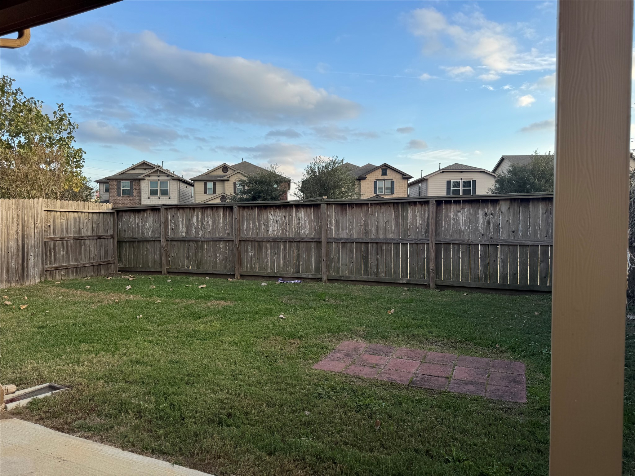 15815 Copper Oak Lane Houston, TX 77084 - Photo 32 of 33 a view of a backyard with a garden and wooden fence