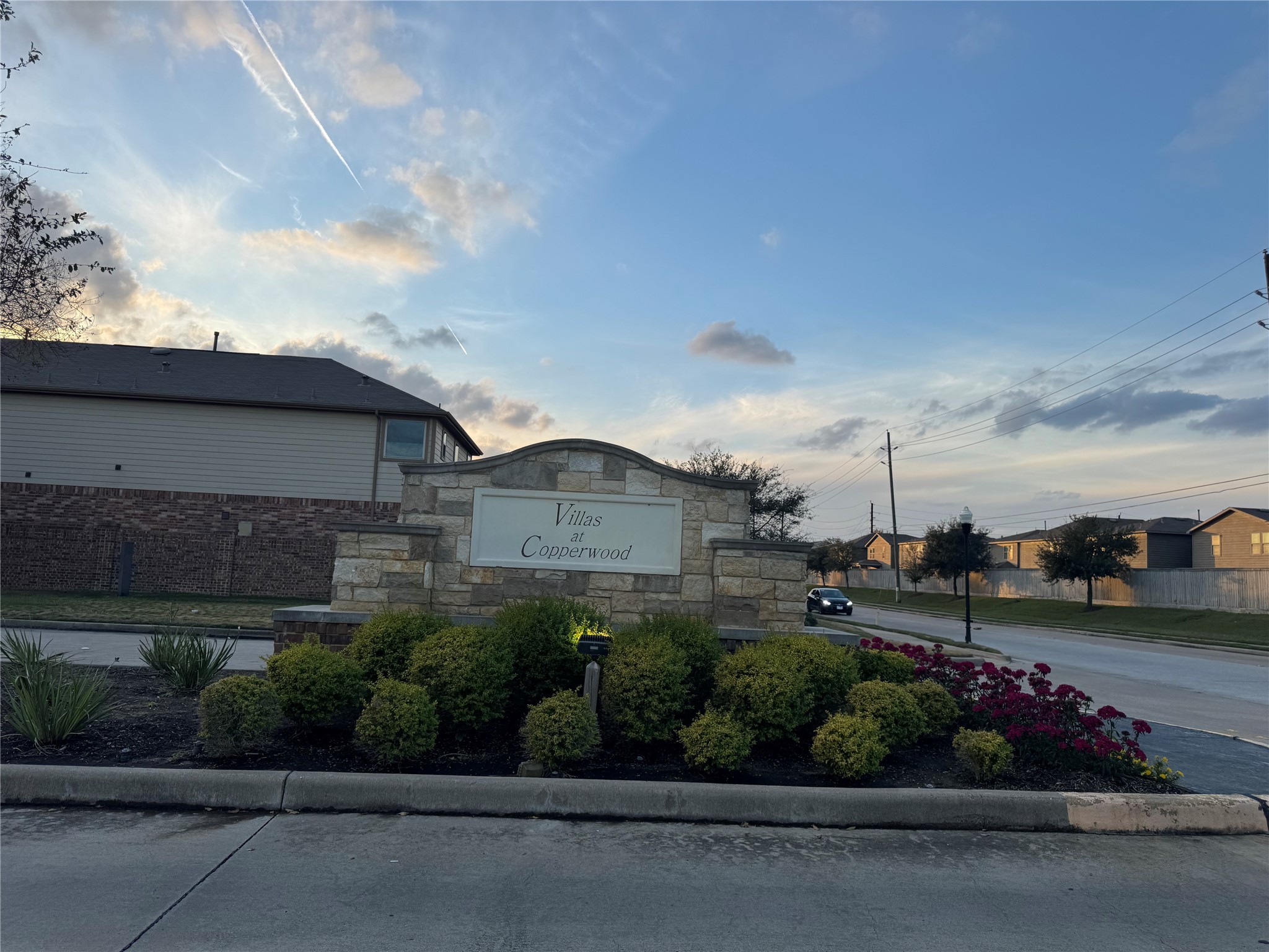 15815 Copper Oak Lane Houston, TX 77084 - Photo 33 of 33 a front view of a house with a garden