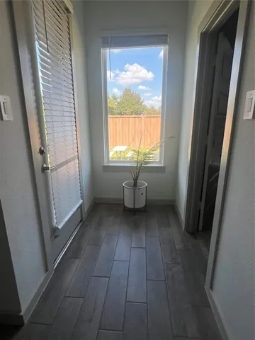 a view of a bathroom with a bathtub
