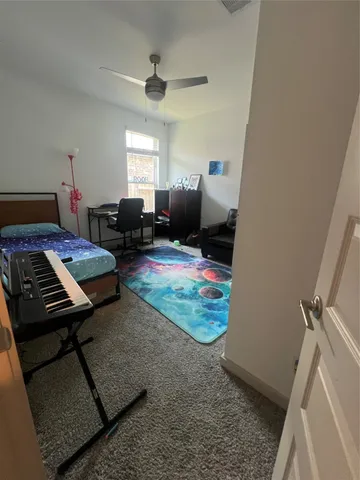 a outdoor living space with furniture and a fireplace