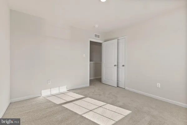 an empty room with an entryway