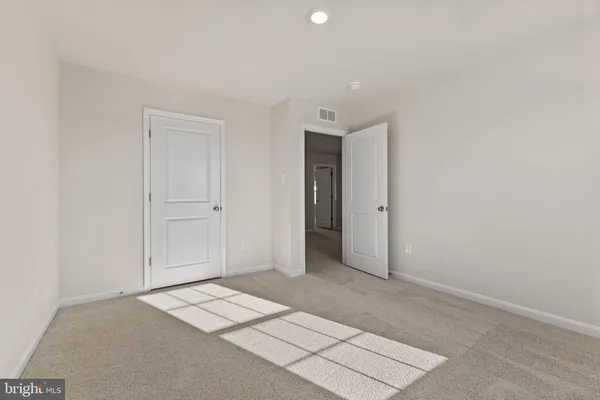 an empty room with an entryway