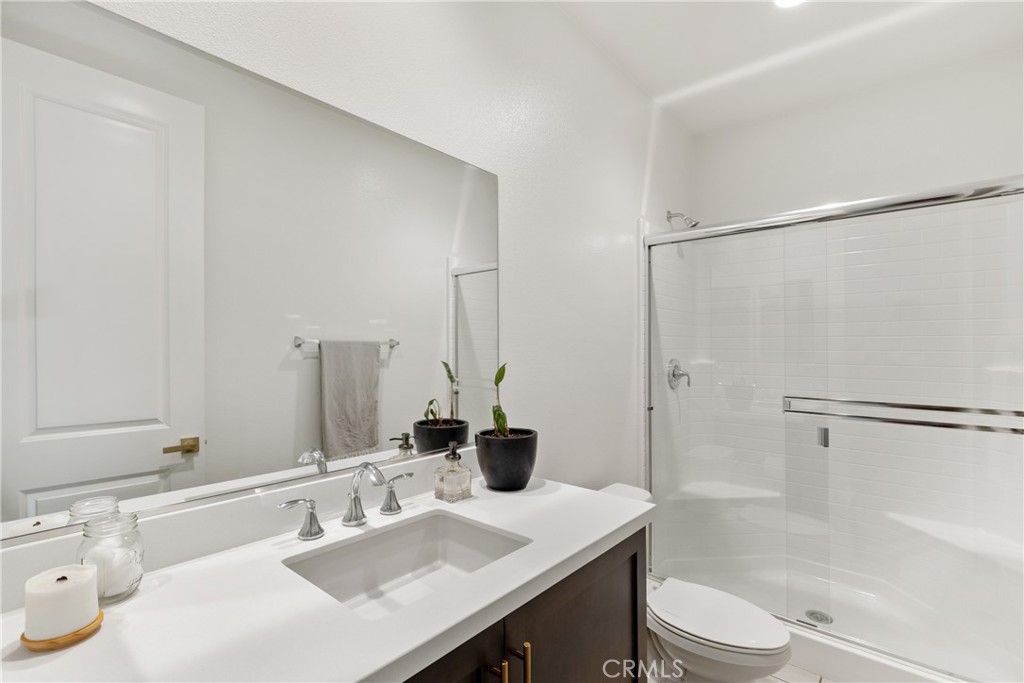 28341 Heather Grn Way Menifee, CA 92584 - Photo 11 of 44 Down stairs main house full bathroom next to bedroom/office