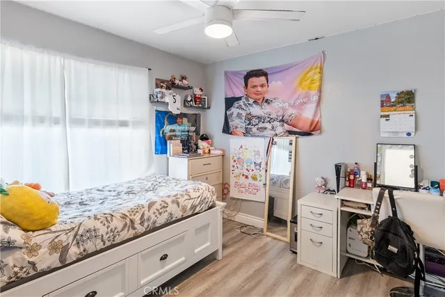 a bedroom with a bed and furniture