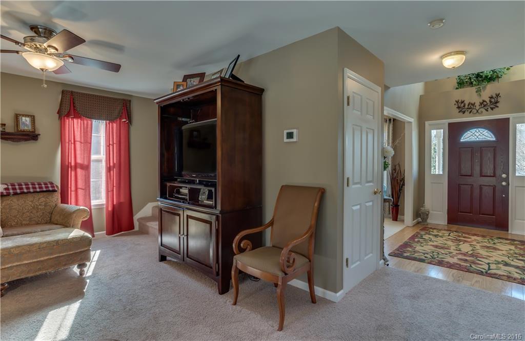 110 Bechtler Court Rutherfordton, NC 28139 - Photo 12 of 24 a view of a livingroom with furniture and a ceiling fan