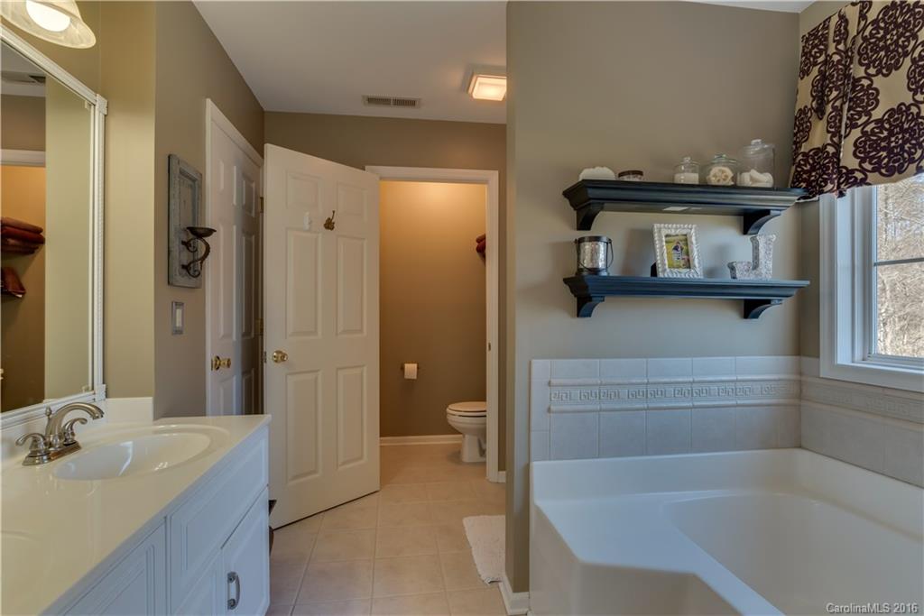 110 Bechtler Court Rutherfordton, NC 28139 - Photo 18 of 24 a bathroom with a sink a toilet and shower
