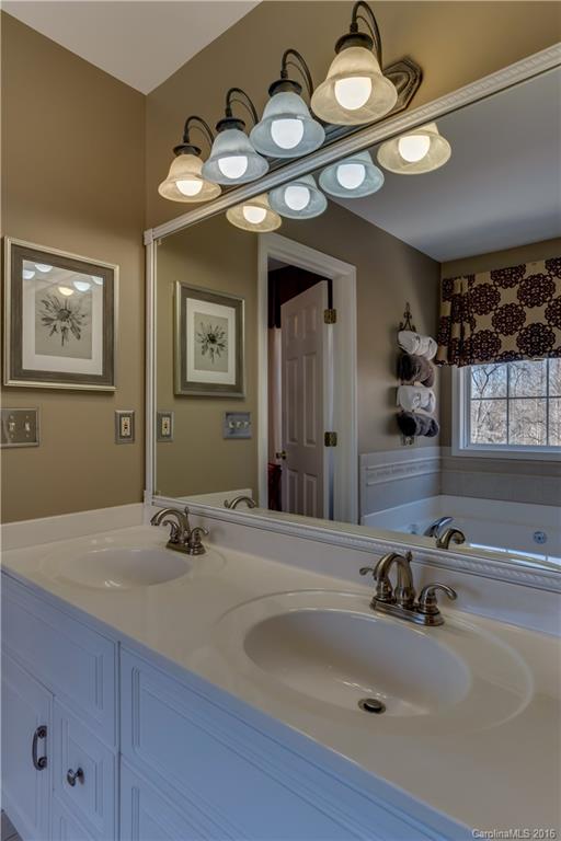 110 Bechtler Court Rutherfordton, NC 28139 - Photo 20 of 24 a bathroom with a sink and a mirror