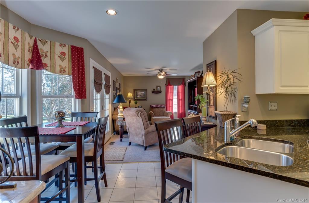 110 Bechtler Court Rutherfordton, NC 28139 - Photo 10 of 24 a kitchen with granite countertop lots of counter top space and dining table