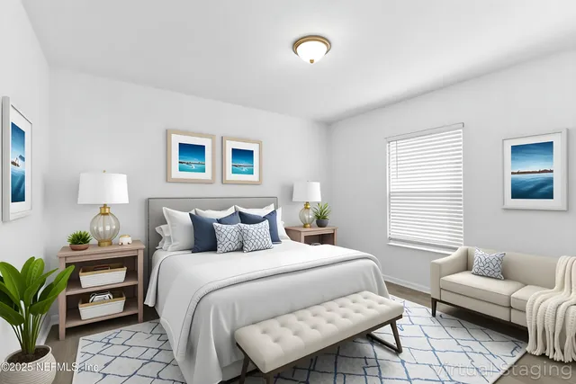 a view of swimming pool with outdoor seating and house in the background