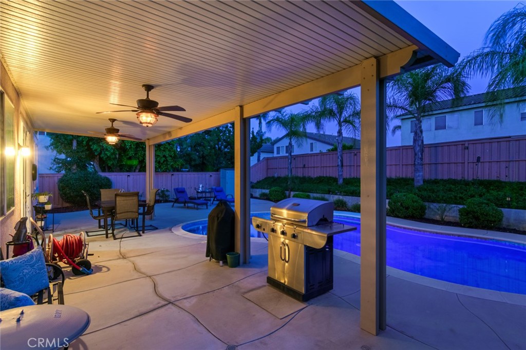 20885 Bakal Drive Riverside, CA 92508 - Photo 39 of 47 a view of a tables and chairs in patio