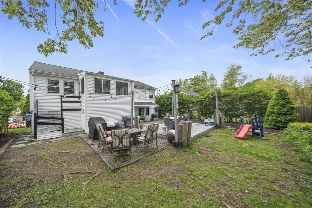 15 D Street Hull, MA 02045 - Photo 29 of 42 a view of a backyard with a sitting area and furniture