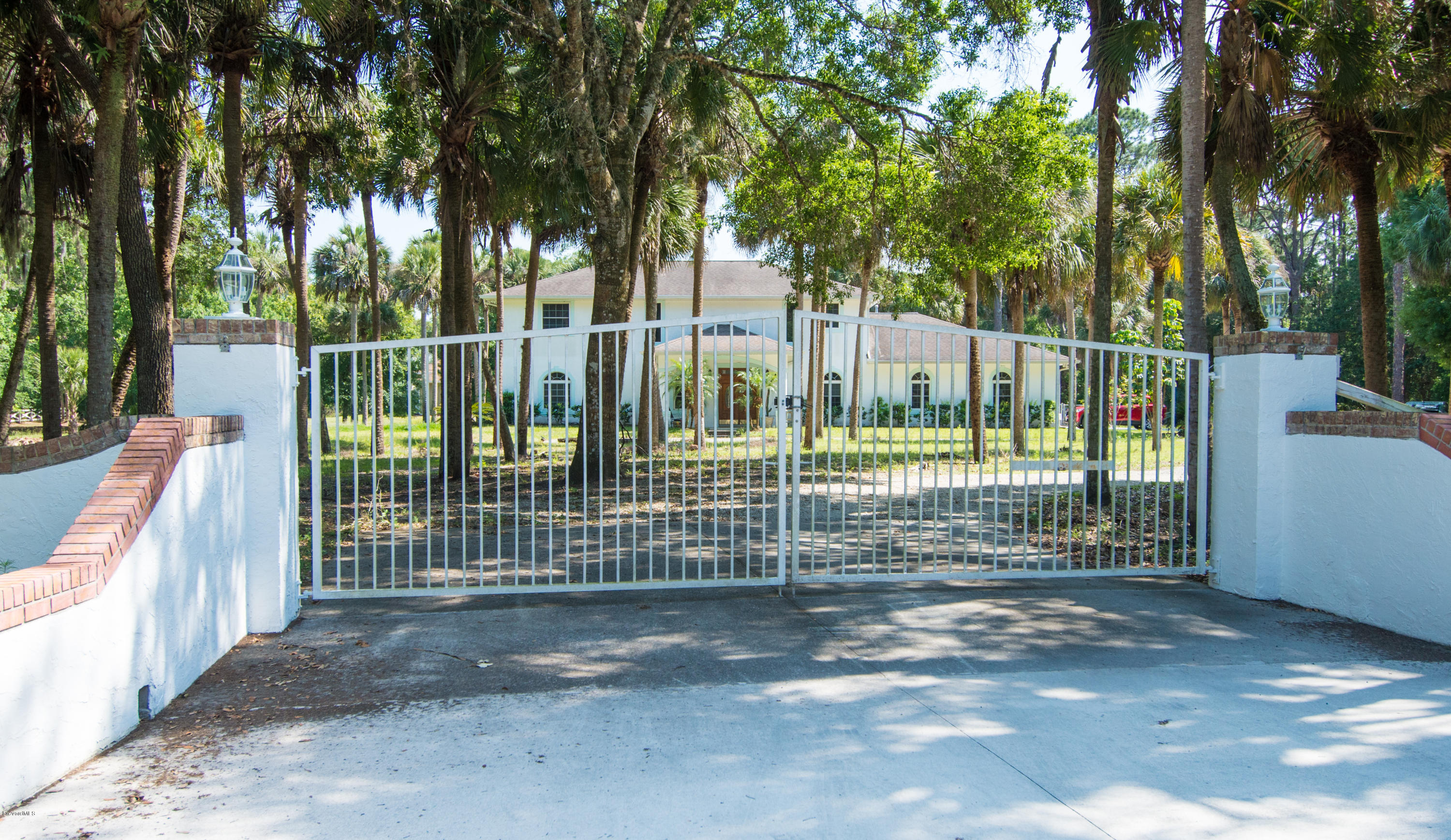 2523 Hooper Road Cocoa, FL 32926 - Photo 17 of 19 Gated Entrance