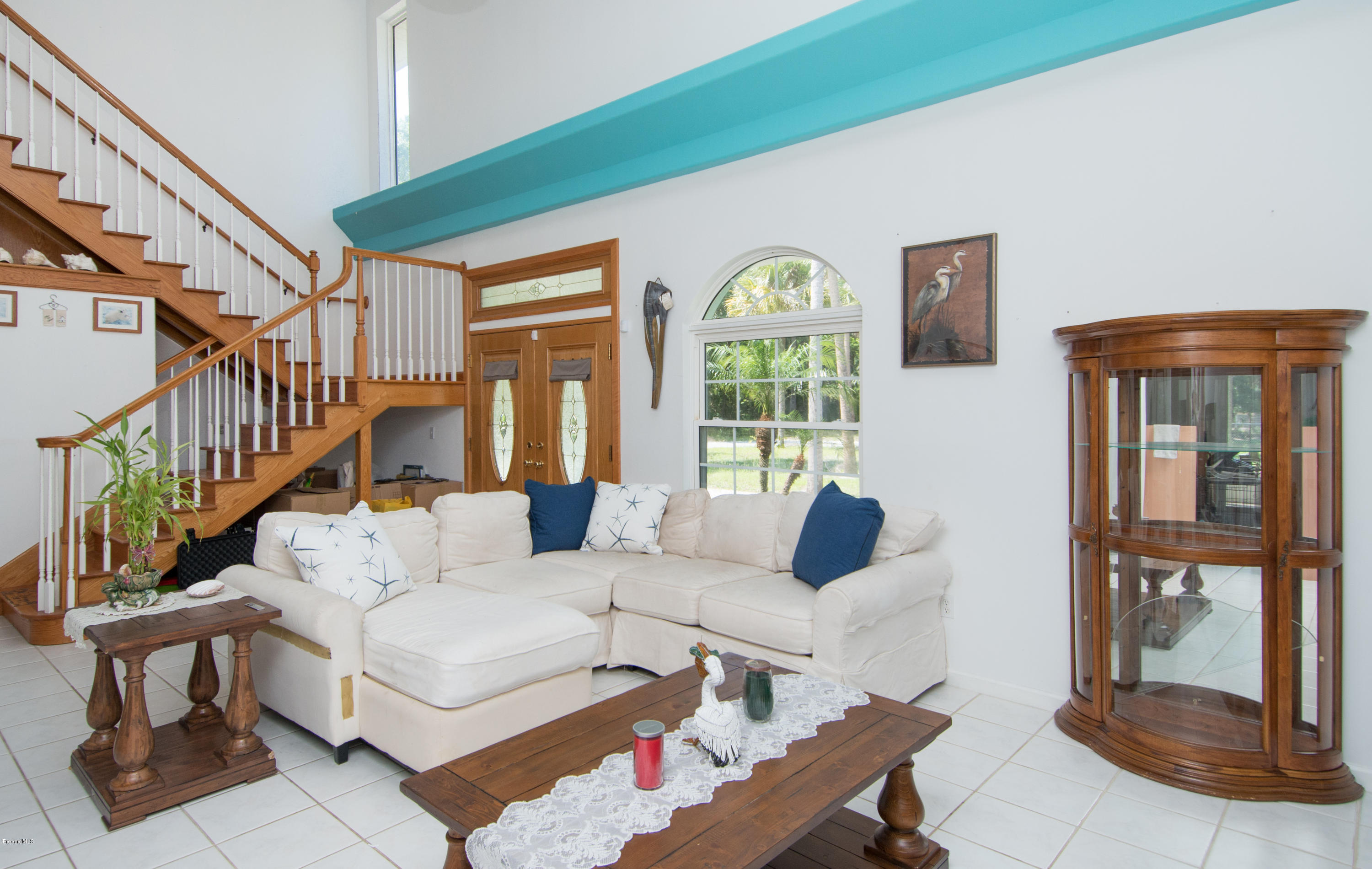 2523 Hooper Road Cocoa, FL 32926 - Photo 5 of 19 Formal Living with Oak Staircase