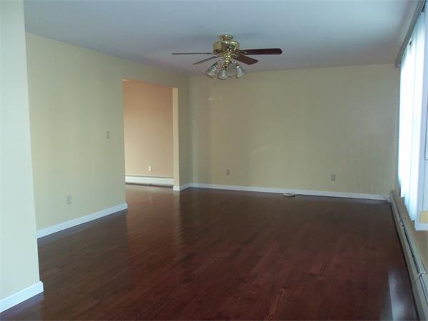 85 Baird Street Fall River, MA 02721 - Photo 2 of 8 an empty room with a window