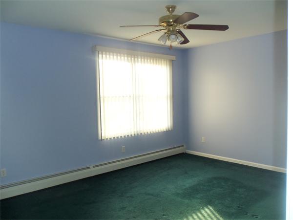 85 Baird Street Fall River, MA 02721 - Photo 4 of 8 an empty room with a window