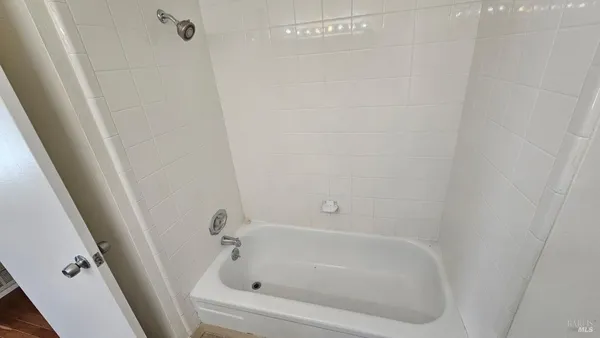 a close view of a bathtub in bathroom