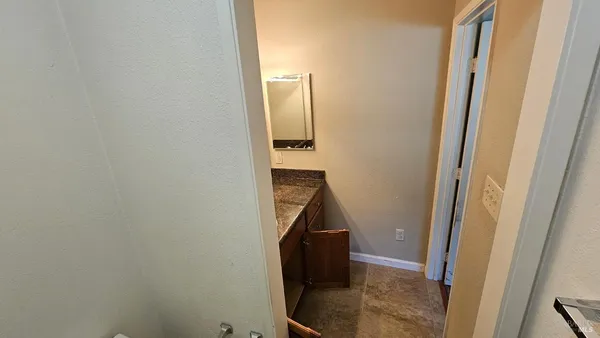 a view of hallway with stairs