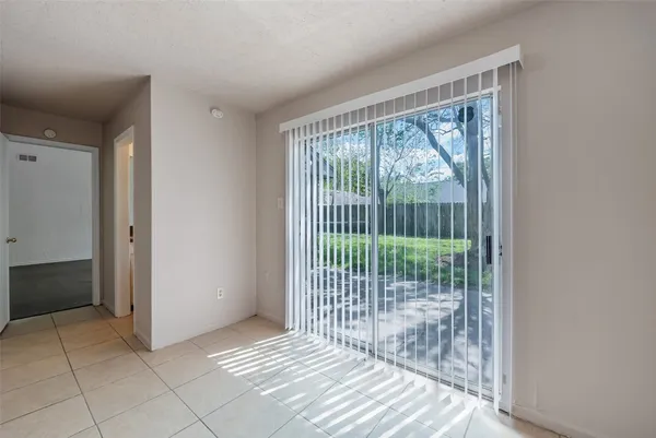 a view of a room with windows