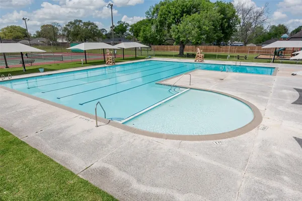 swimming pool view with a outdoor space