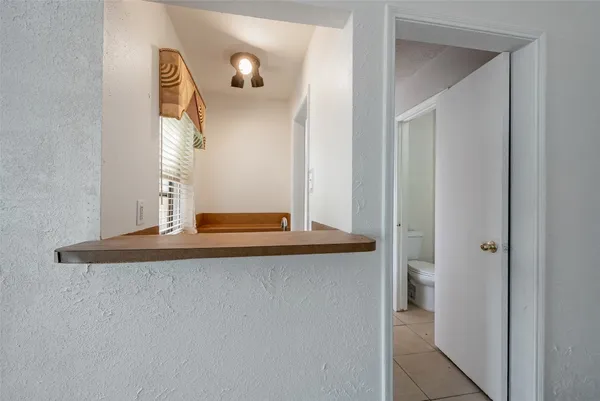a picture of a bathroom with a sink and a mirror