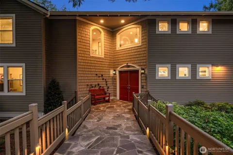 a view of a pathway both side of house
