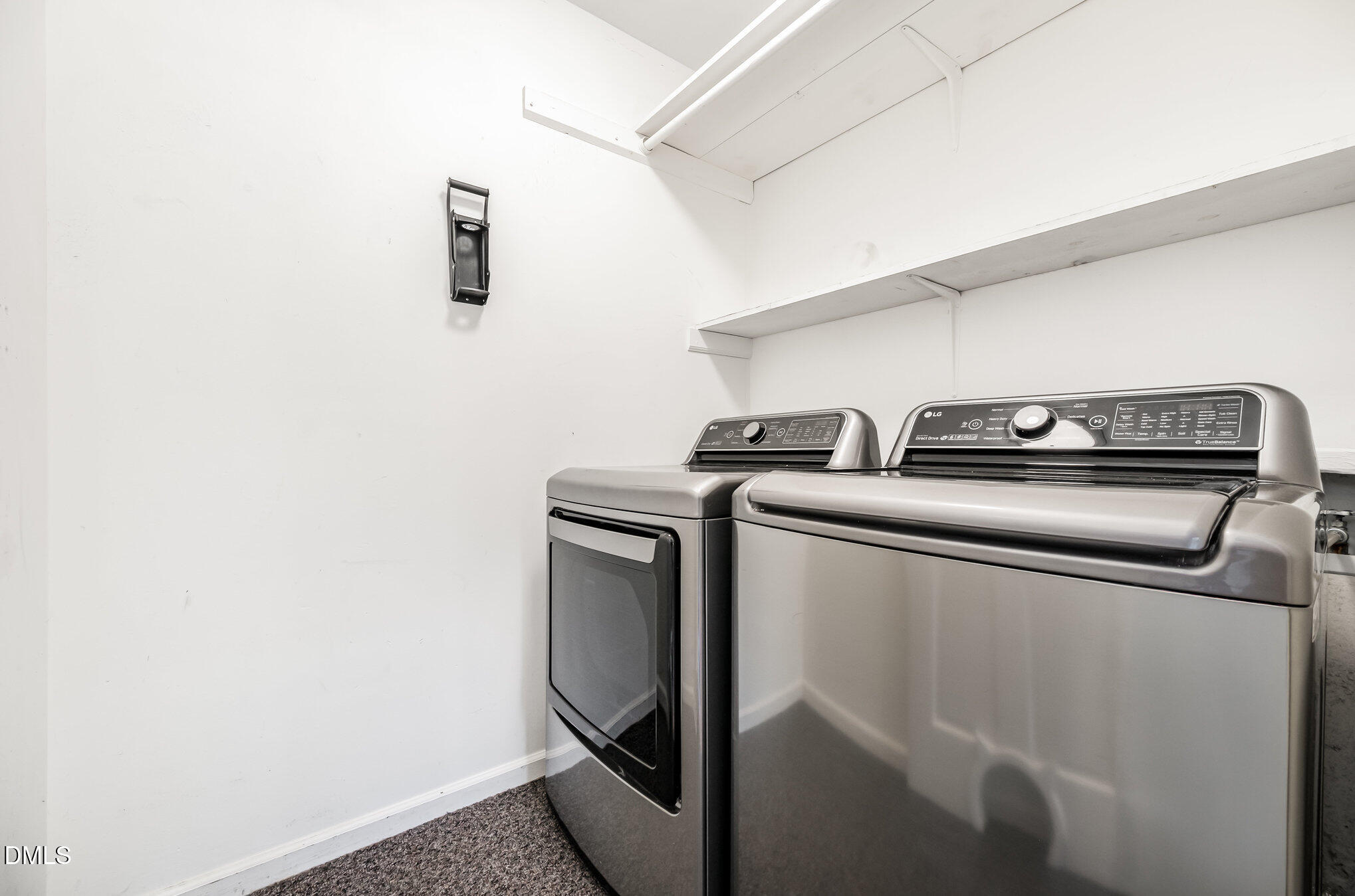 709 Brent Road Raleigh, NC 27606 - Photo 17 of 24 a utility room with dryer and washer