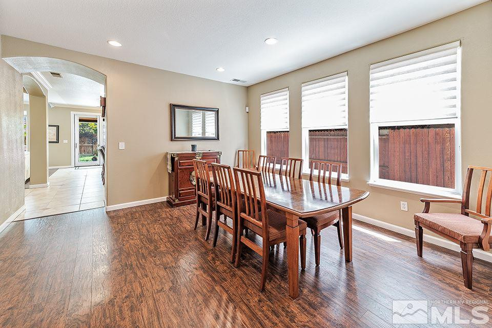 1783 Back Country Road Reno, NV 89521 - Photo 5 of 16 a dining room with furniture window and wooden floor