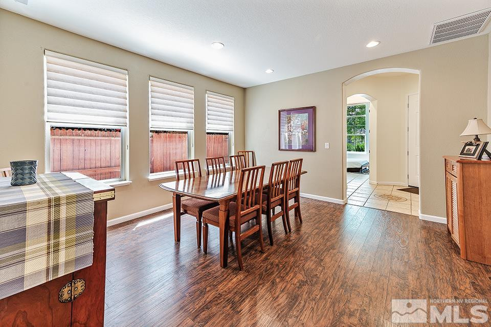 1783 Back Country Road Reno, NV 89521 - Photo 6 of 16 a view of a dining room with furniture window and wooden floor