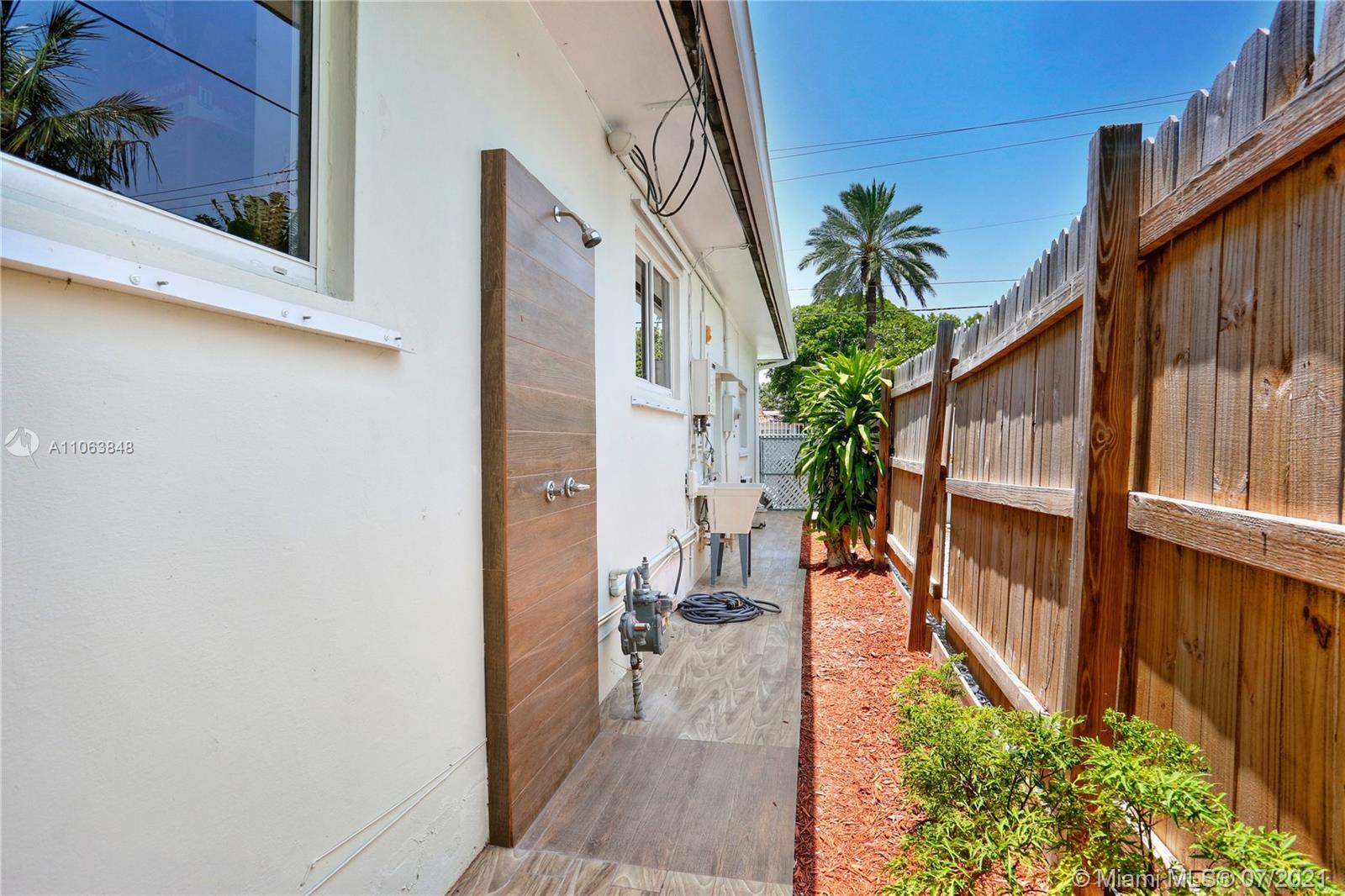 4755 Alton Road Miami Beach, FL 33140 - Photo 17 of 21 a view of entryway with patio