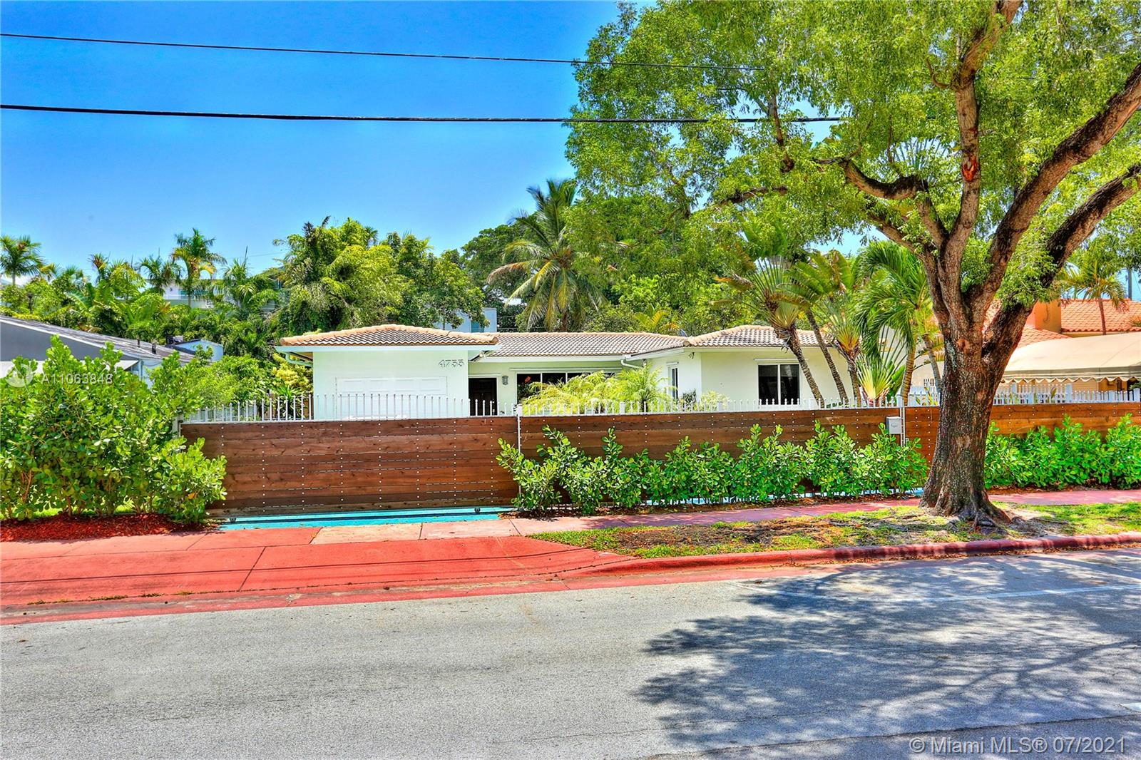 4755 Alton Road Miami Beach, FL 33140 - Photo 20 of 21 a view of street and electric pole on its side