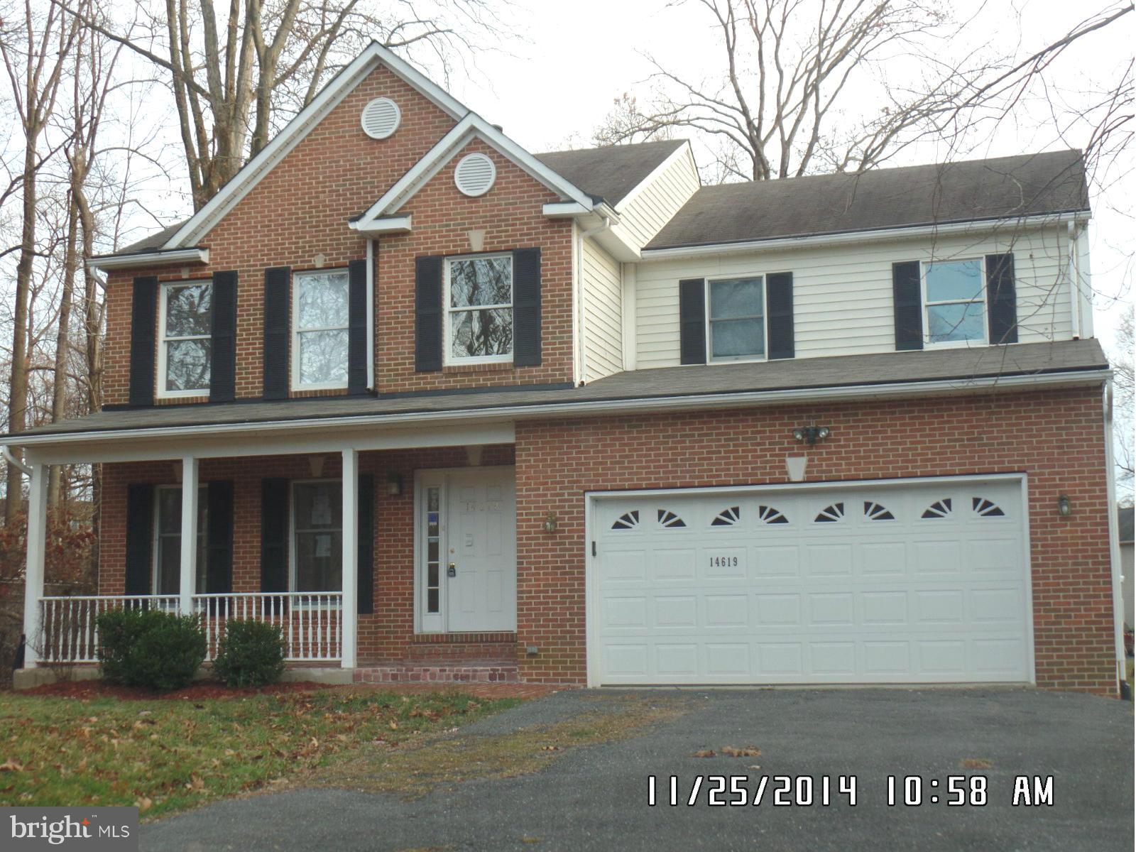 14619 Good Hope Road Silver Spring, MD 20905 - Photo 1 of 23 a front view of a house with garden