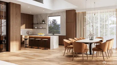 a kitchen with stainless steel appliances kitchen island granite countertop a dining table and chairs