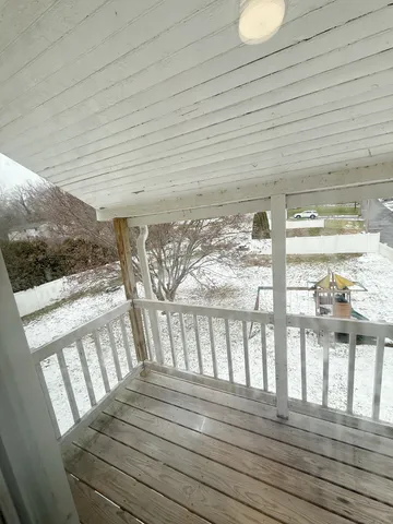a view of wooden floor in a balcony