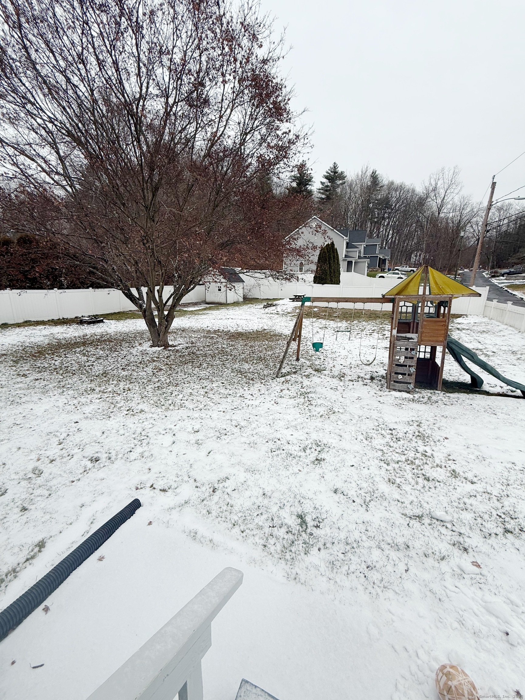 1716 Farmington Avenue Farmington, CT 06085 - Photo 21 of 22 a view of a dry yard with wooden fence