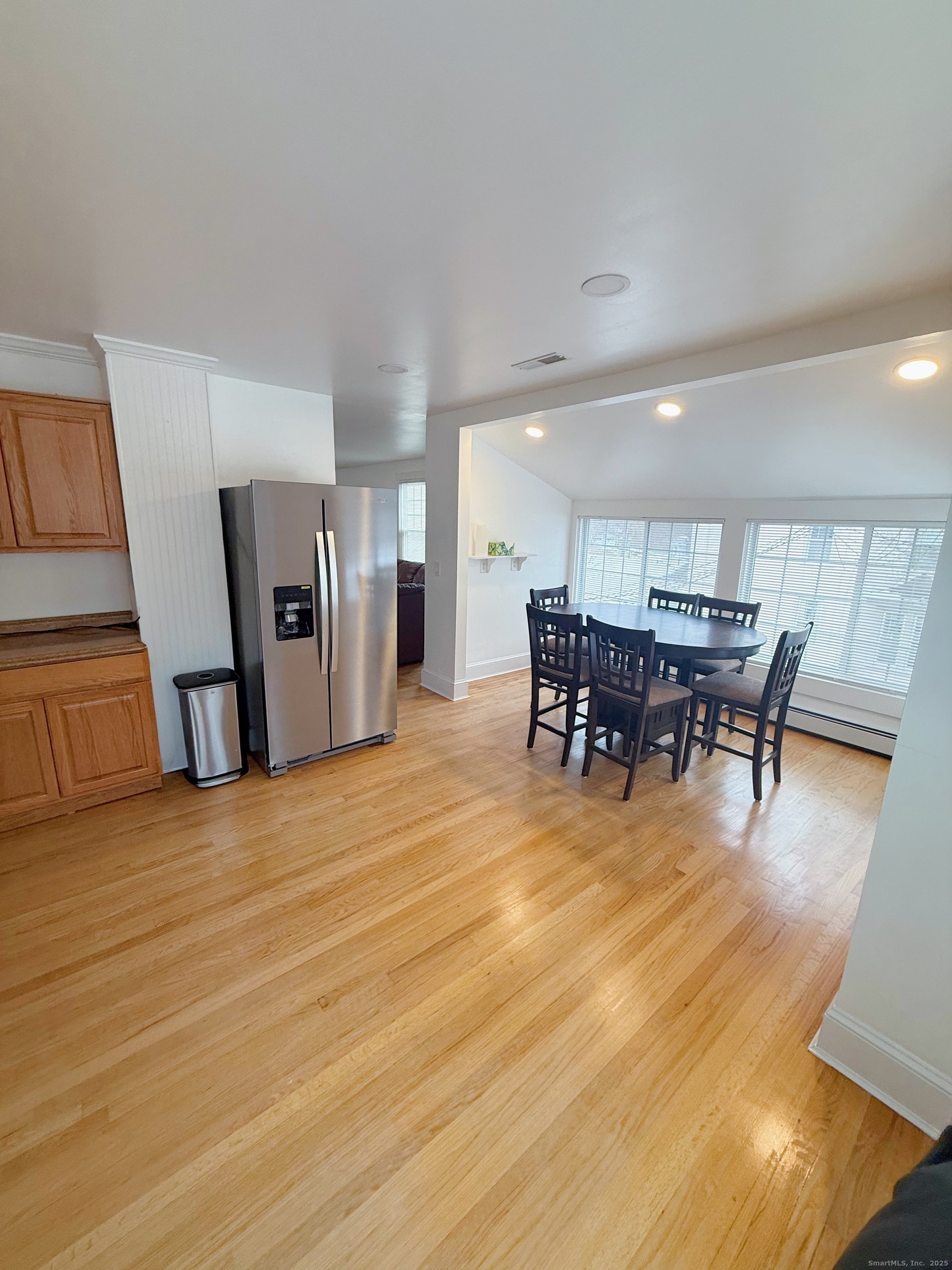 1716 Farmington Avenue Farmington, CT 06085 - Photo 10 of 22 a view of a kitchen with dining room and wooden floor