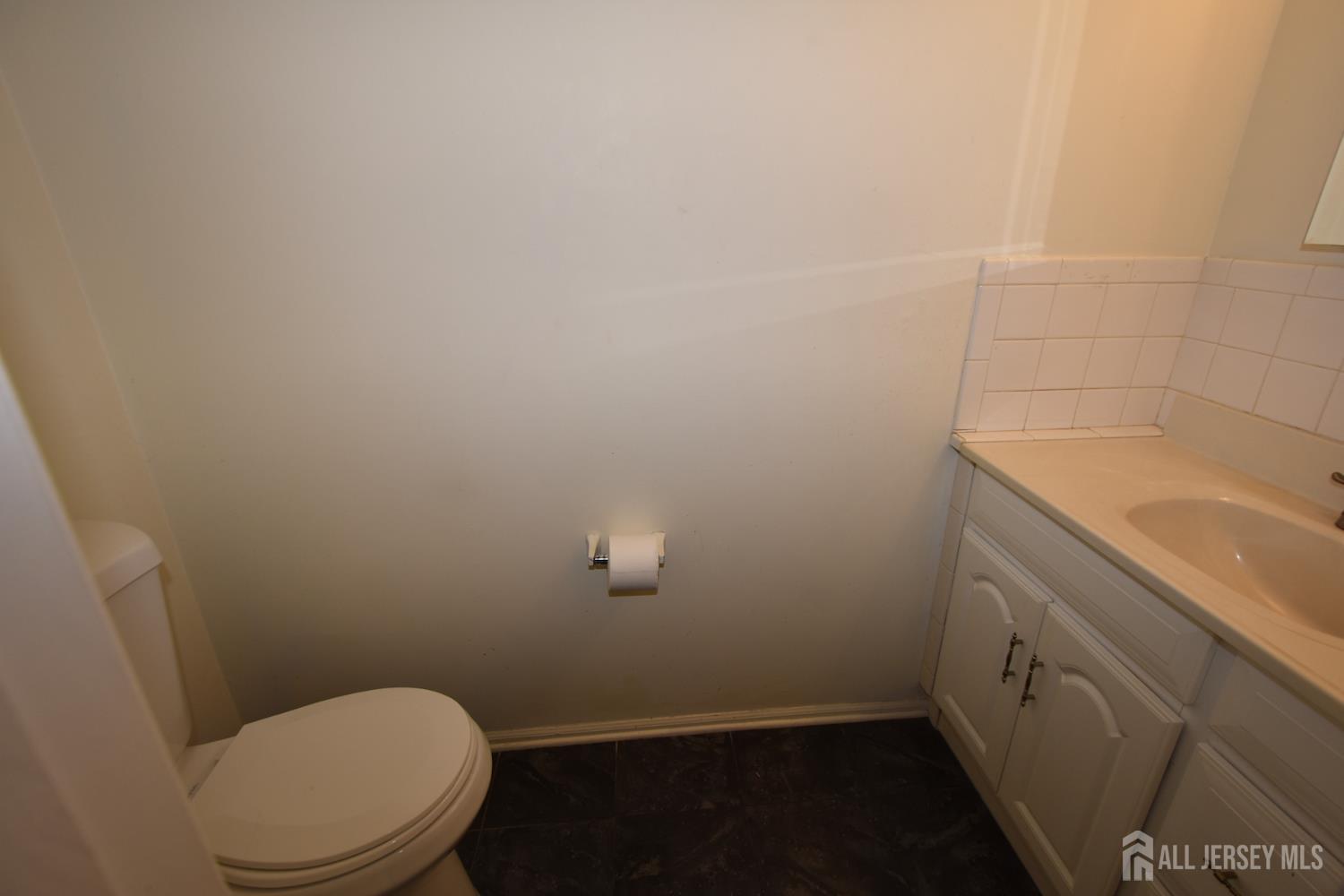 8 Wethersfield Road Plainsboro, NJ 08536 - Photo 14 of 28 a bathroom with a sink and toilet