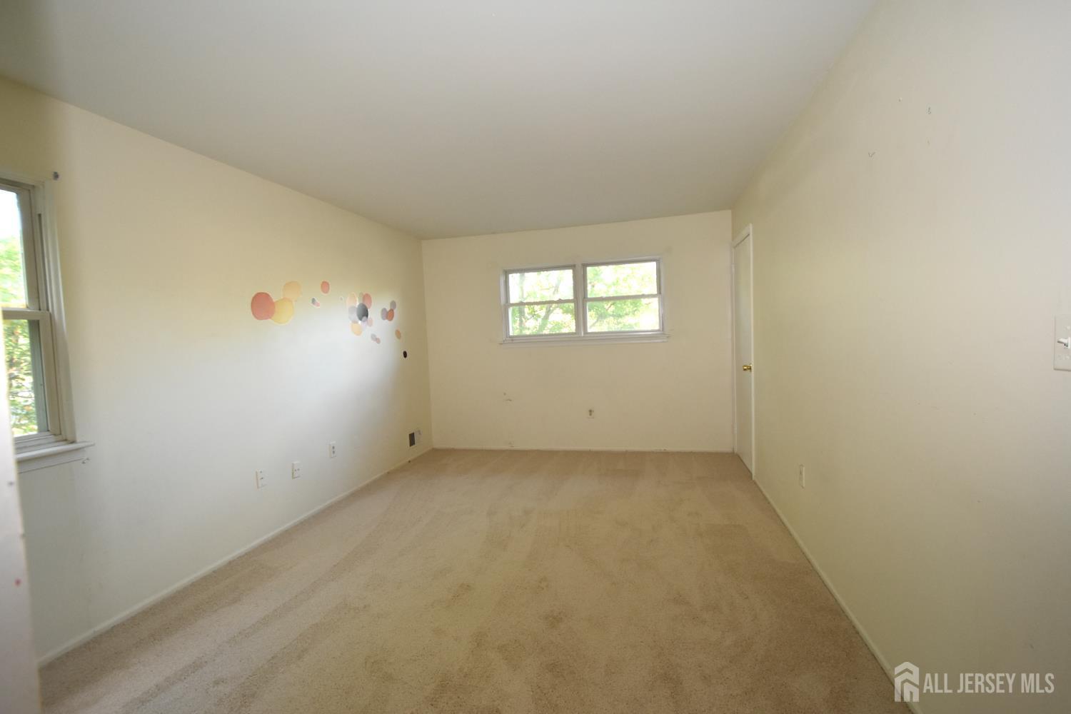 8 Wethersfield Road Plainsboro, NJ 08536 - Photo 16 of 28 an empty room with windows
