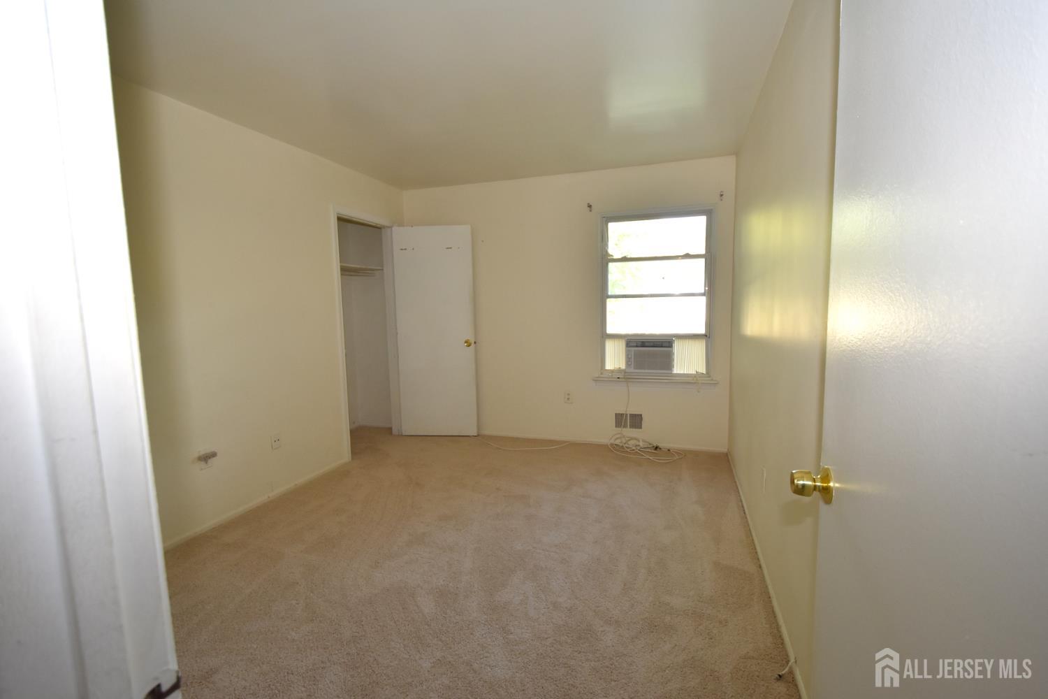 8 Wethersfield Road Plainsboro, NJ 08536 - Photo 23 of 28 a view of an empty room with window and a bathroom
