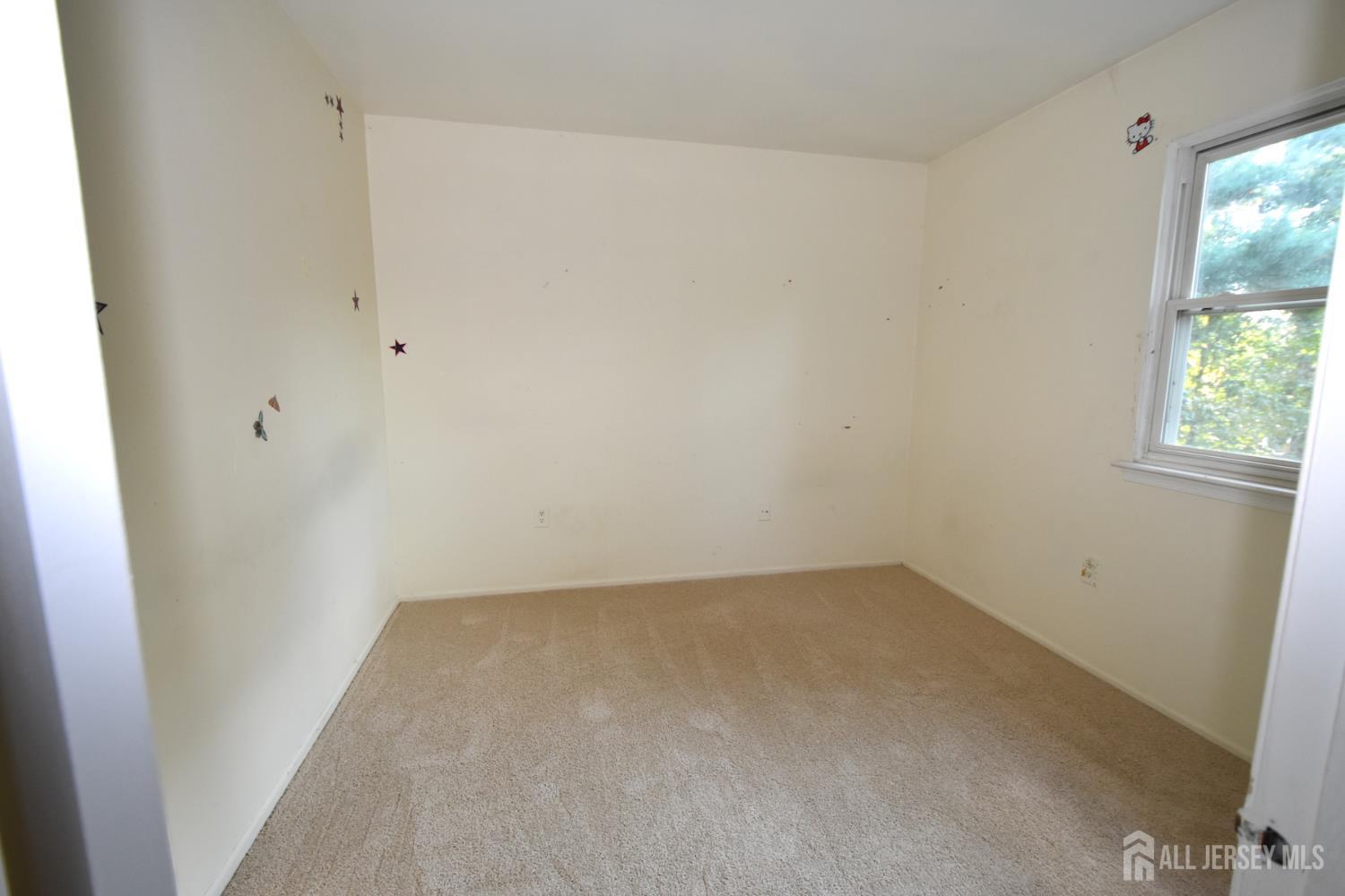 8 Wethersfield Road Plainsboro, NJ 08536 - Photo 24 of 28 an empty room with a window