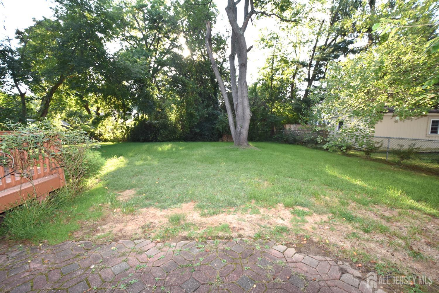 8 Wethersfield Road Plainsboro, NJ 08536 - Photo 25 of 28 a view of a yard with a trees