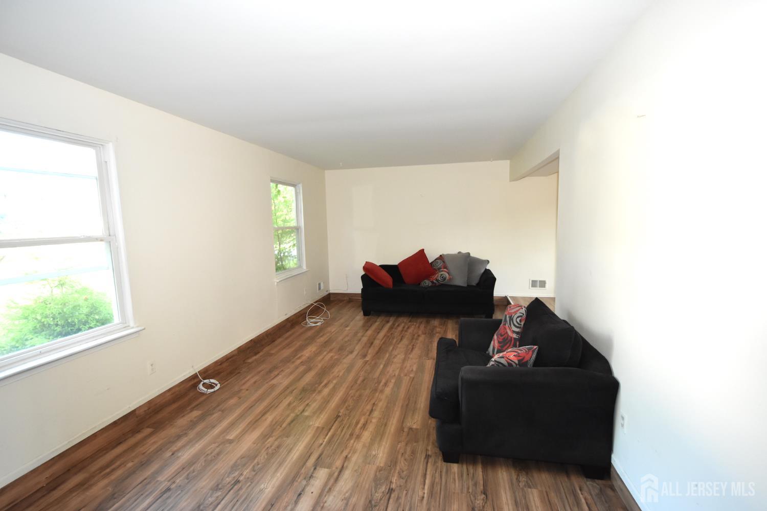 8 Wethersfield Road Plainsboro, NJ 08536 - Photo 5 of 28 a living room with furniture and a window