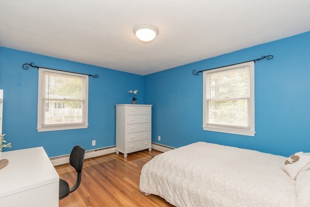 2 Marilyn Road Billerica, MA 01821 - Photo 16 of 32 a bedroom with a bed and window