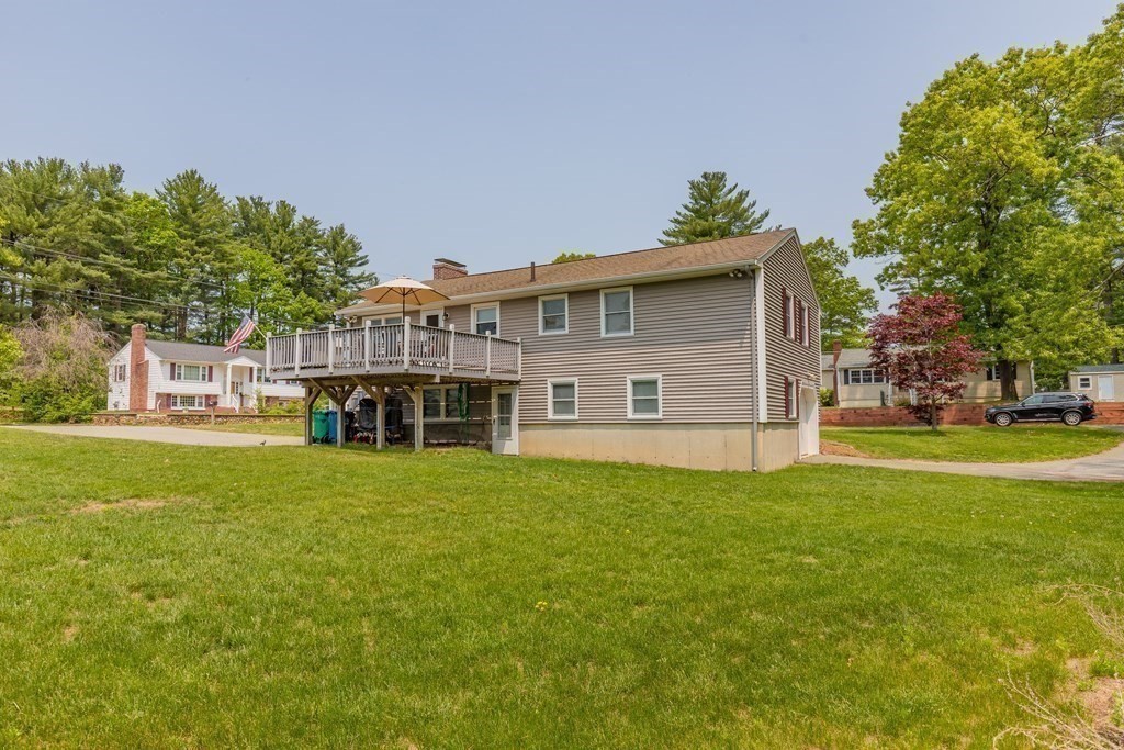2 Marilyn Road Billerica, MA 01821 - Photo 30 of 32 a front view of a house with a garden