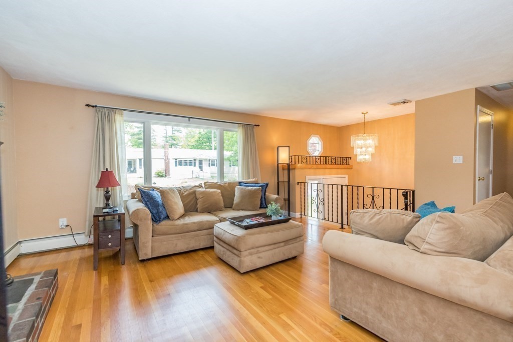 2 Marilyn Road Billerica, MA 01821 - Photo 3 of 32 a living room with furniture and a large window
