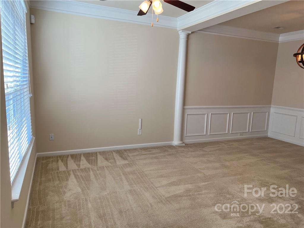 2016 Aston Mill Place Charlotte, NC 28273 - Photo 2 of 13 a view of an empty room with chandelier fan and window
