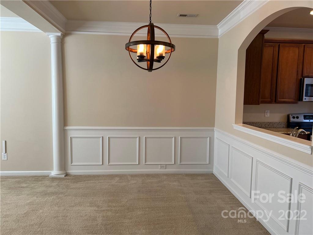 2016 Aston Mill Place Charlotte, NC 28273 - Photo 4 of 13 an empty room with mirror and windows