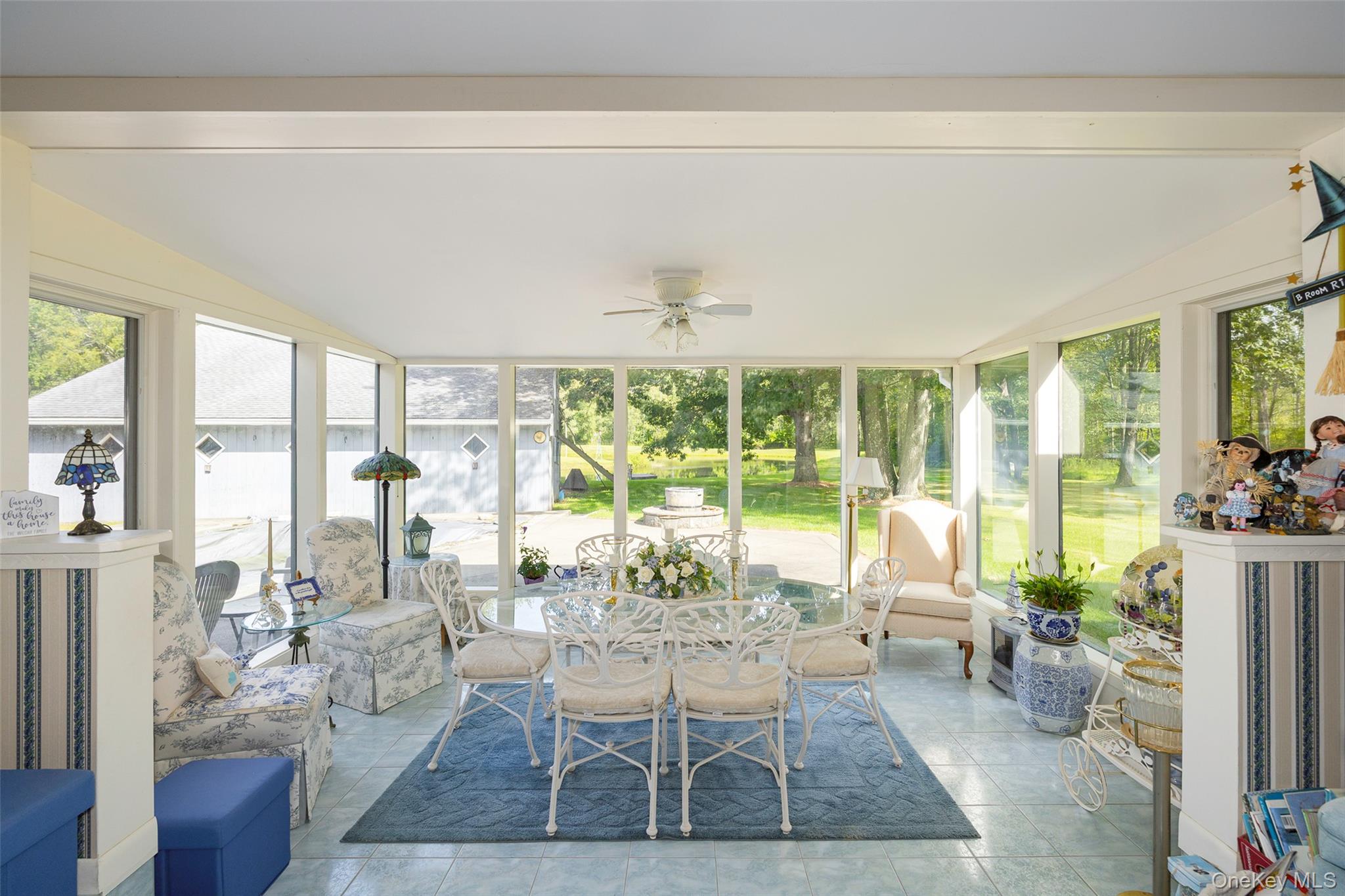 89 Deer Pond Road Verbank, NY 12585 - Photo 12 of 40 a living room with furniture and a large window
