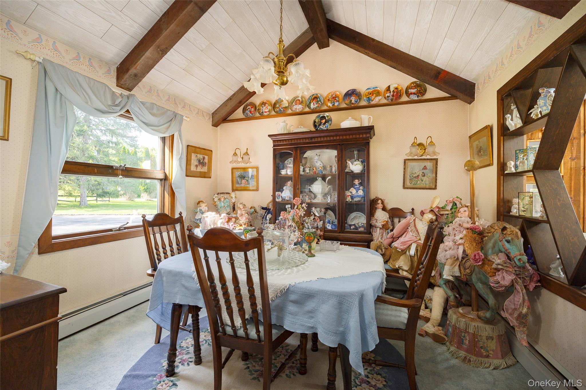 89 Deer Pond Road Verbank, NY 12585 - Photo 18 of 40 a view of a dining room with furniture window and outside view